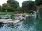 This shot of the Playboy Mansion pool and the outside of the grotto was taken in 2002. It looks very much the same now.