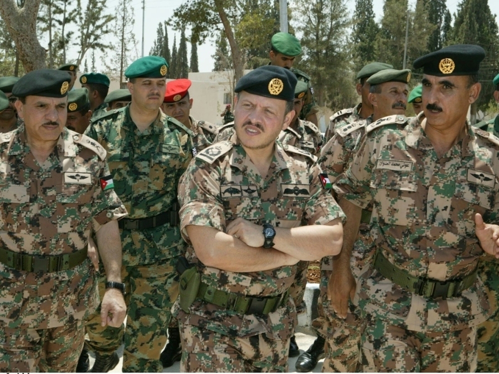 King Abdullah II of Jordan visits the Royal Military College in Guy Cramer's camouflage.