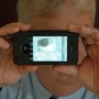 Sean Mullin, CEO of BI2 Technologies, scans his own eye with the MORIS, or Mobile Offender Recognition and Information System. The device attaches to an iPhone and allows police in the field to scan a person's iris, face or fingerprint and then check it against a database to verify his or her identity. Sean Mullin, CEO of BI2 Technologies, scans his own eye with the MORIS, or Mobile Offender Recognition and Information System. The device attaches to an iPhone and allows police in the field to scan a person's iris, face or fingerprint and then check it against a database to verify his or her identity.
