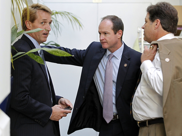 Republican congressmen Jeff Flake of Arizona, (l) a publicly announced "no" vote; John Sullivan of Oklahoma (c), and Bill Shuster of Pennsylvania, Wednesday, July 27, 2011.