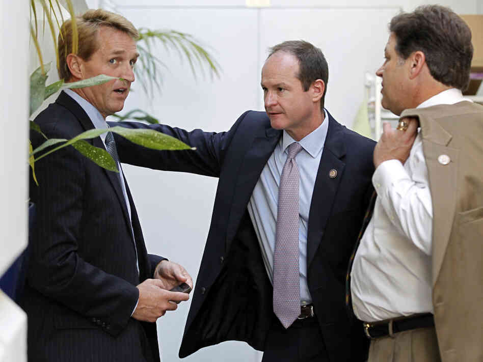 Republican congressmen Jeff Flake of Arizona, (l) a publicly announced "no" vote; John Sullivan of Oklahoma (c), and Bill Shuster of Pennsylvania, Wednesday, July 27, 2011.