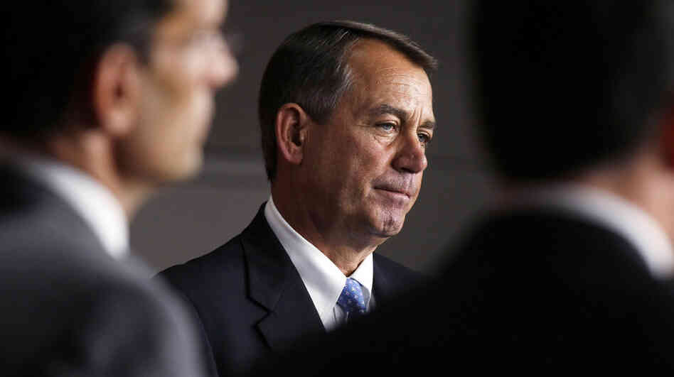 House Speaker John Boehner (R-OH) attended a news conference Thursday in Washington, hours before Republicans were forced to postpone a vote on his debt-ceiling legislation.