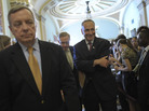 Sen. Harry Reid (center) with Sen. Richard Durbin (left) and Sen. Charles Schumer after a news conference on Friday. Sen. Harry Reid (center) with Sen. Richard Durbin (left) and Sen. Charles Schumer after a news conference on Friday.