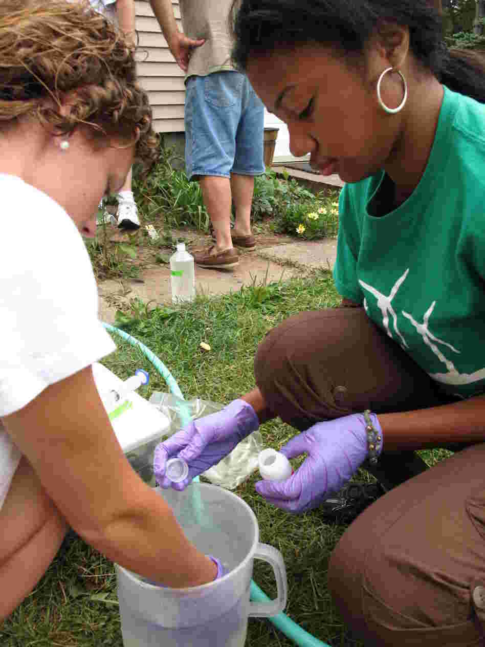 Duke University students test well water at Carl Young's house in northern Pennsylvania. They are looking for methane and other chemicals that might have contaminated his well water as a result of fracking.