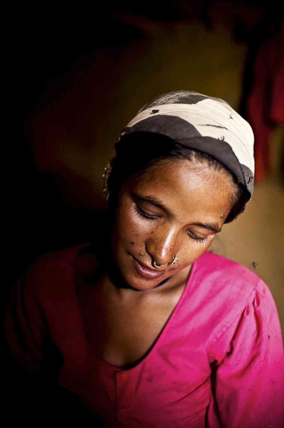 Maheshwori was married at 15 and gave birth to her first child, a girl, at 16. The birth occurred in a cow shed and took three days because the baby was breech. The community thought she would die.