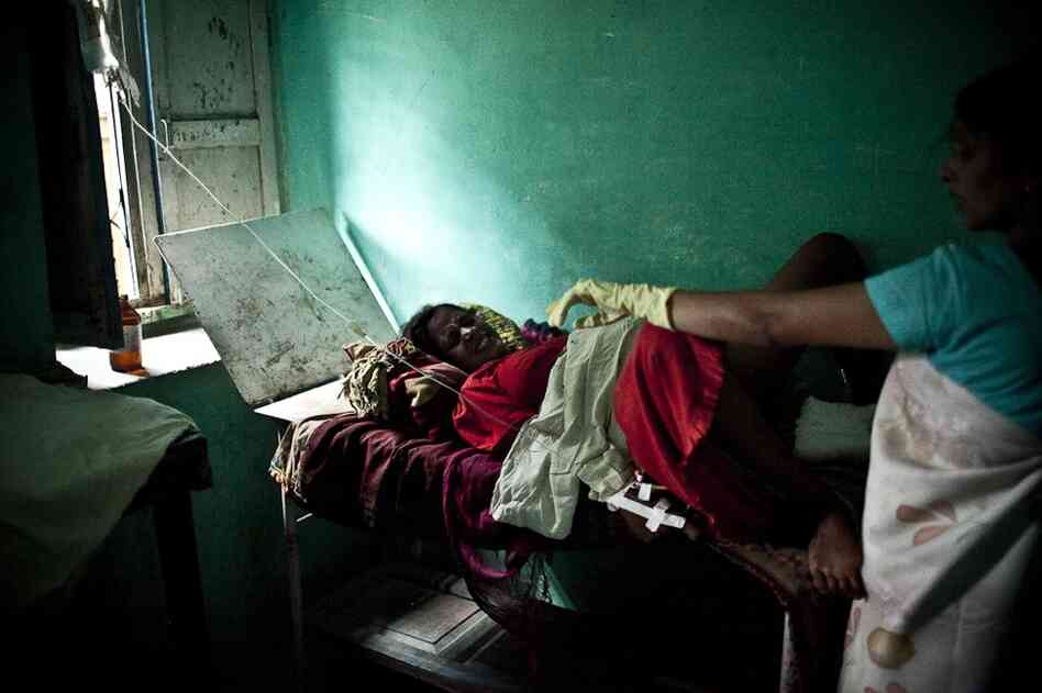 Yasodha Ojha, a skilled birth attendant, delivers nearly 50 babies each month and is known throughout the district for her birthing skills. The birth is still not easy.