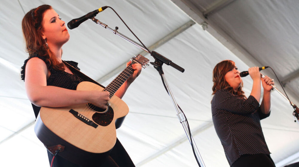 Secret Sisters' Laura and Lydia Rogers perform at the 2011 Newport Folk Festival.