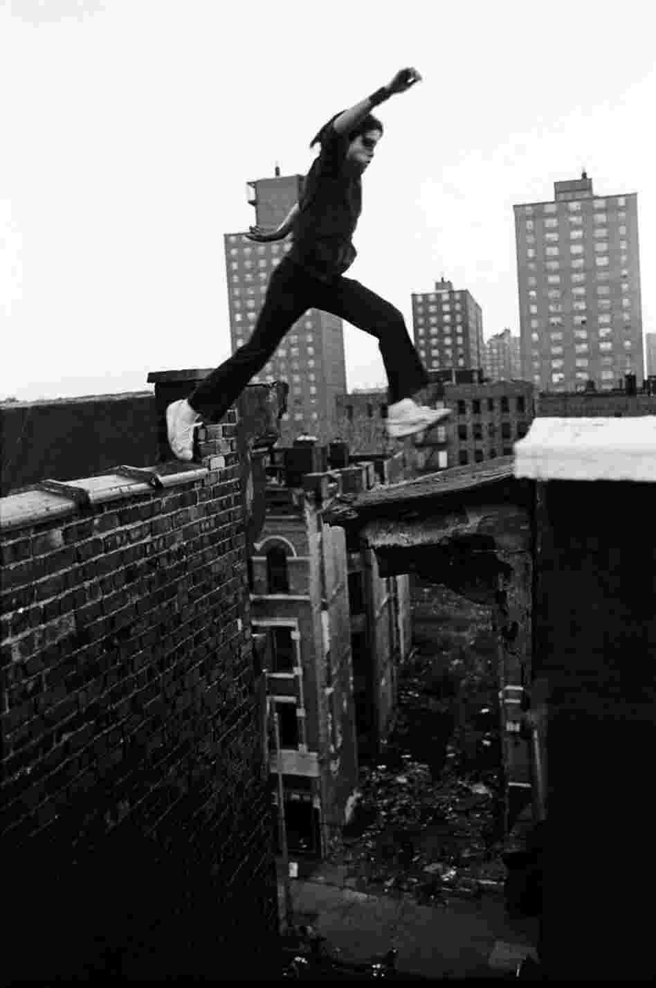 Rafael, 13, jumps between buildings, eight stories up, 1977 Rafael, 13, jumps between buildings, eight stories up, 1977