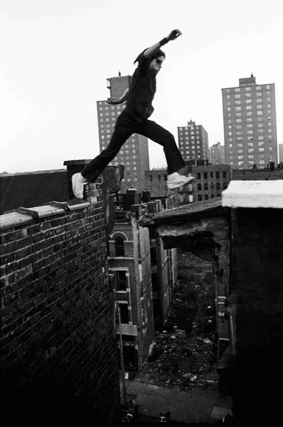Rafael, 13, jumps between buildings, eight stories up, 1977 Rafael, 13, jumps between buildings, eight stories up, 1977