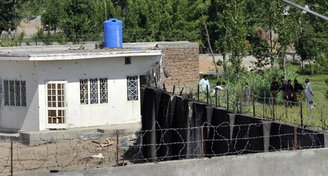 Policemen stand guard outside the compound used as a hideout by Osama bin Laden, the day after a U.S. raid killed the al Qaida leader in Abbottabad, Pakistan. Policemen stand guard outside the compound used as a hideout by Osama bin Laden, the day after a U.S. raid killed the al Qaida leader in Abbottabad, Pakistan.