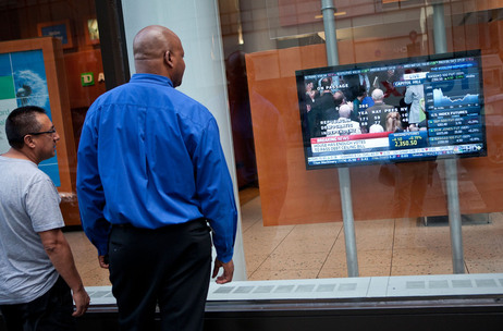 The House vote on raising the debt ceiling drew the interest of passers-by in New York. The bill will now head to the Senate, which is expected to vote on it Tuesday. The House vote on raising the debt ceiling drew the interest of passers-by in New York. The bill will now head to the Senate, which is expected to vote on it Tuesday.