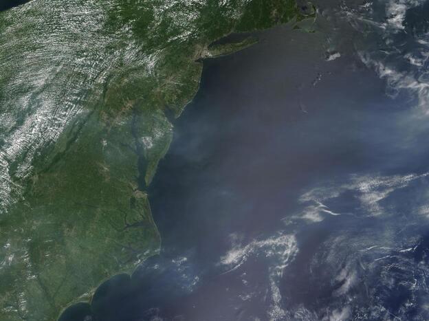 The Moderate Resolution Imaging Spectroradiometer on a NASA satellite captured this image on the morning of Aug. 2 as temperatures were beginning to climb. At the time, a high heat advisory was in effect for the region. The haze appears to be concentrated over the Atlantic Ocean, east of Washington, D.C., but this may be an illusion.