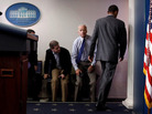 President Obama walks past Vice President Joe Biden and aide Dan Pfeiffer in the briefing room Sunday. President Obama walks past Vice President Joe Biden and aide Dan Pfeiffer in the briefing room Sunday.