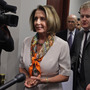 The House voted Monday to extend the federal debt limit and enact spending cuts. Here, House Minority Leader Nancy Pelosi arrives for a meeting with House Democrats and Vice President Joe Biden at the Capitol. The House voted Monday to extend the federal debt limit and enact spending cuts. Here, House Minority Leader Nancy Pelosi arrives for a meeting with House Democrats and Vice President Joe Biden at the Capitol.
