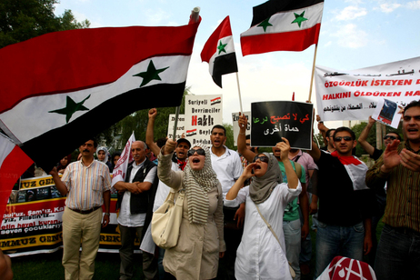 A pro-Islamic human rights group chants slogans as they call for the removal of Syrian president Bashar al Assad and his regime during a demonstration outside the Syrian Embassy in Ankara. A pro-Islamic human rights group chants slogans as they call for the removal of Syrian president Bashar al Assad and his regime during a demonstration outside the Syrian Embassy in Ankara.