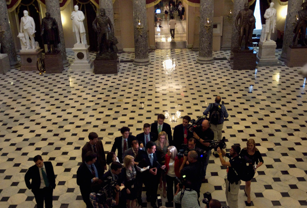 House Majority Leader Eric Cantor (R-VA) speaks with reporters after the House voted to raise the debt ceiling.