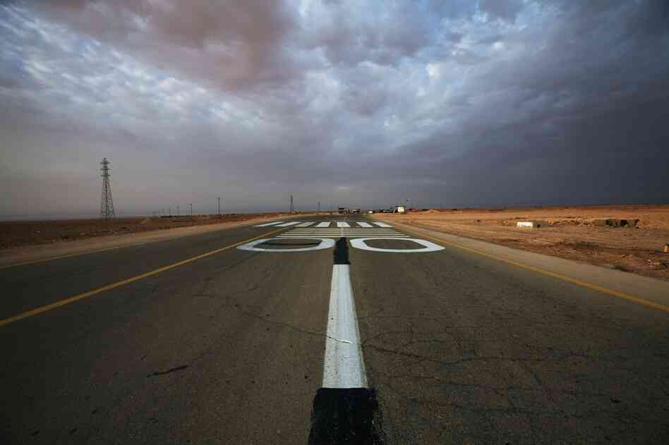 The makeshift runway in Rhybat serves planes flying between the rebel stronghold of Benghazi in the east and the Nafusa Mountains in the west.
