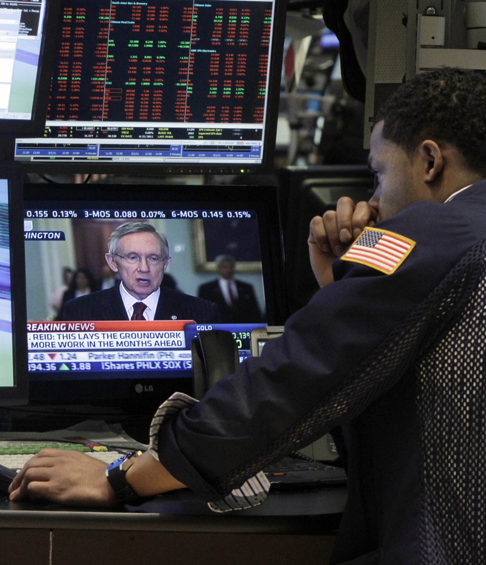 Sen. Harry Reid on a television on the floor of the New York Stock Exchange.