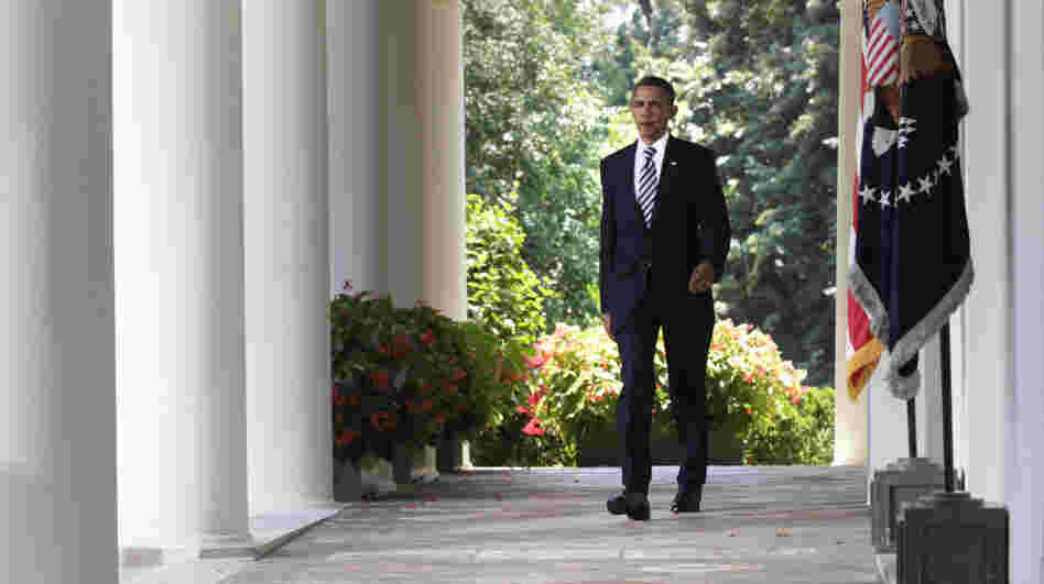 President Obama walks to the Rose Garden of the White House to discuss the debt-ceiling bill passed by the Senate. President Obama walks to the Rose Garden of the White House to discuss the debt-ceiling bill passed by the Senate.