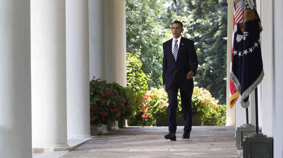 President Obama walks to the Rose Garden of the White House to discuss the debt-ceiling bill passed by the Senate. President Obama walks to the Rose Garden of the White House to discuss the debt-ceiling bill passed by the Senate.
