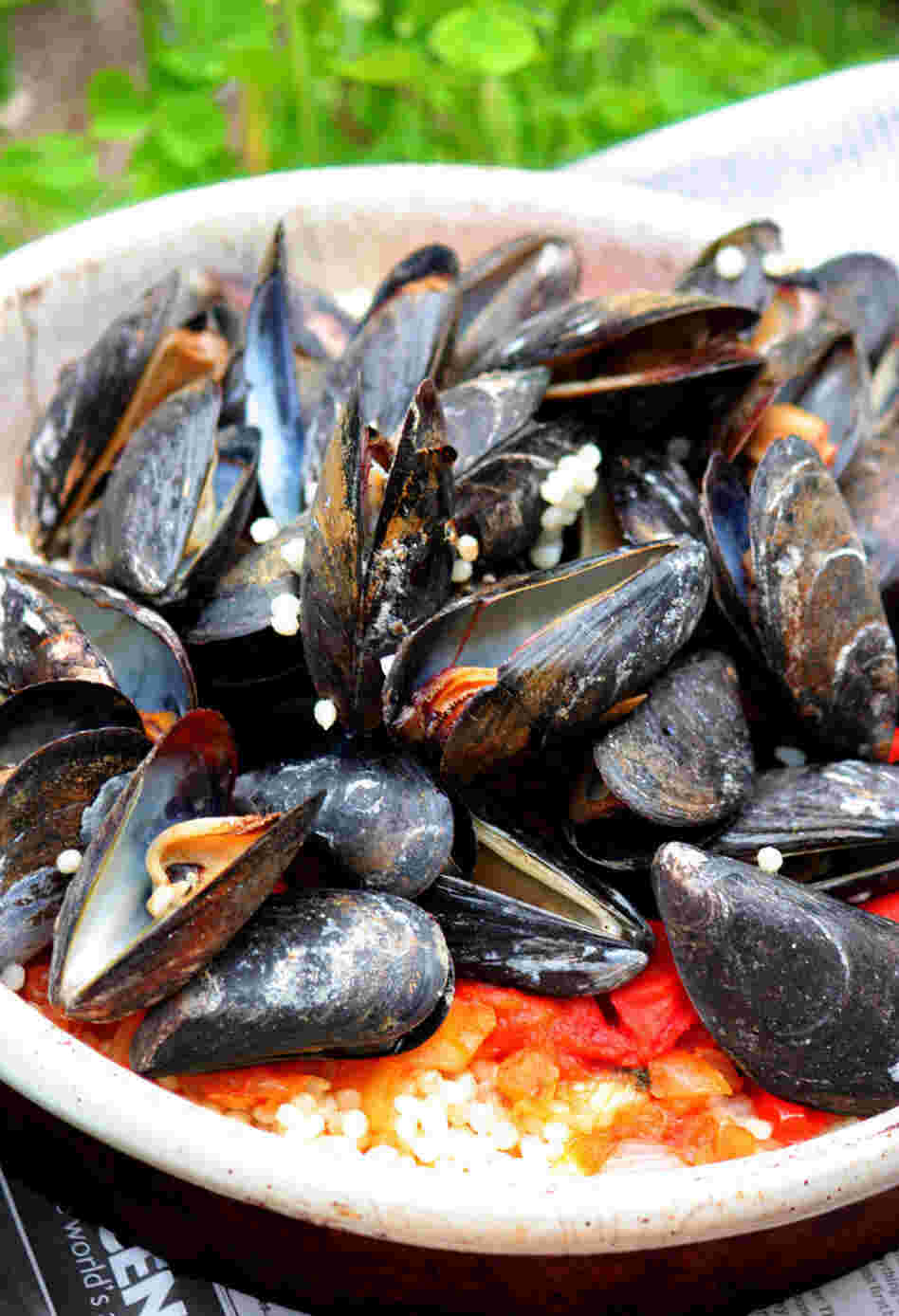 Grilled Mussels With Simmered Tomatoes Over Couscous