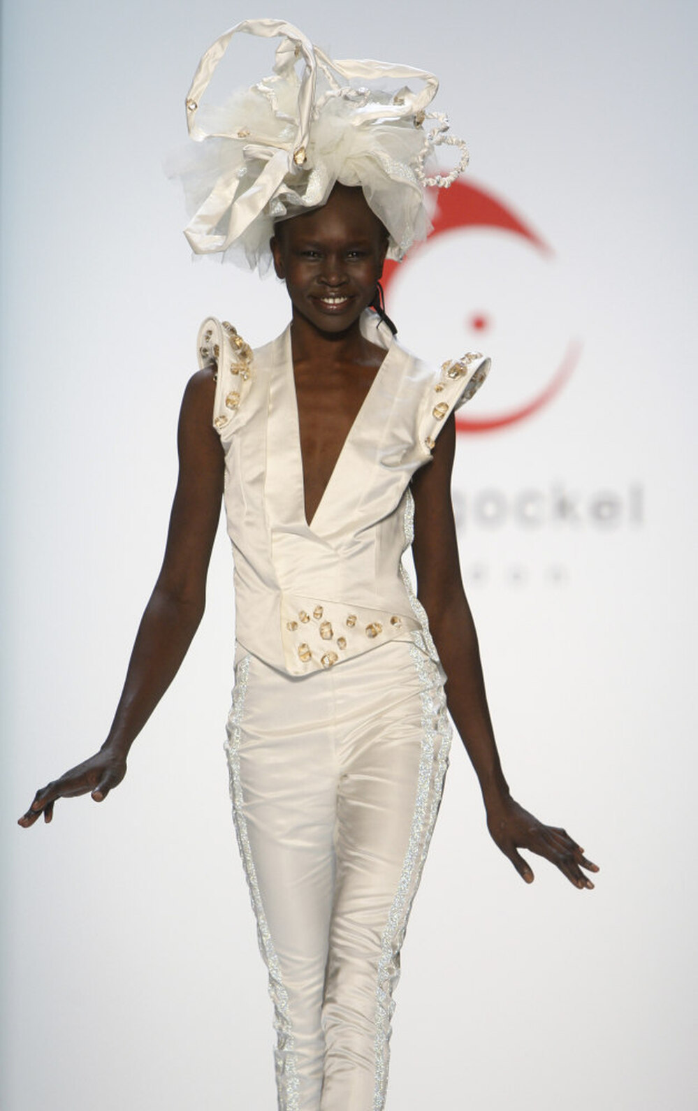 Sudan-born model Alek Wek displays a creation by German fashion designer Anja Gockel, at the Fashion Week in Berlin, Germany, Thursday, Jan. 21, 2010.