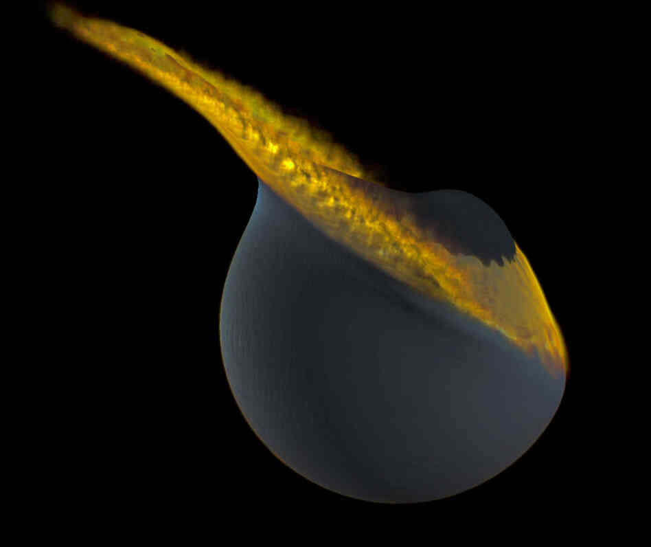 This artist's illustration shows a collision between the moon and a companion moon. Scientists say the collision could be responsible for the moon's asymmetric shape.