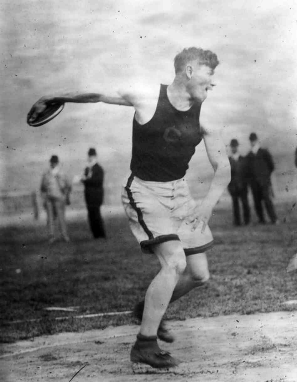 Thorpe throws a discus at the 1912 Olympics in Stockholm, where he won gold medals in both the pentathlon and decathlon events and King Gustav V of Sweden declared him "the most wonderful athlete in the world." After being revoked in 1913 due to a stint as a professional baseball player, his medals were reinstated by the International Olympic Committee in 1982. 