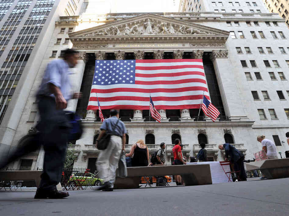 Nearly five hours after the markets closed on Friday, Standard & Poor's downgraded the U.S. credit rating because of political risks and a rising debt burden.