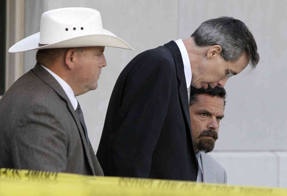 A law enforcement officer, left, escorts Polygamist religious leader Warren Jeffs, center, and his defense advisor Deric Walpole out of the Tom Green County Courthouse in San Angelo, Texas. A jury convicted Jeffs of child sexual assault Thursday. A law enforcement officer, left, escorts Polygamist religious leader Warren Jeffs, center, and his defense advisor Deric Walpole out of the Tom Green County Courthouse in San Angelo, Texas. A jury convicted Jeffs of child sexual assault Thursday.