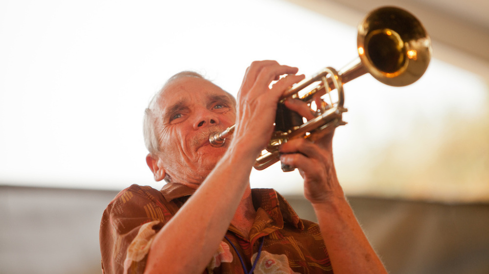 Trumpeter Dave Whitney performs with the New Black Eagle Jazz Band on the Harbor Stage at the Newport Jazz Festival.