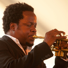 Ambrose Akinmusire performs with his quintet on the Harbor Stage during the Newport Jazz Festival. Ambrose Akinmusire performs with his quintet on the Harbor Stage during the Newport Jazz Festival.