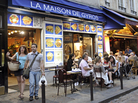 Restaurants line a street of the Quartier Latin in central Paris. Restaurants line a street of the Quartier Latin in central Paris.