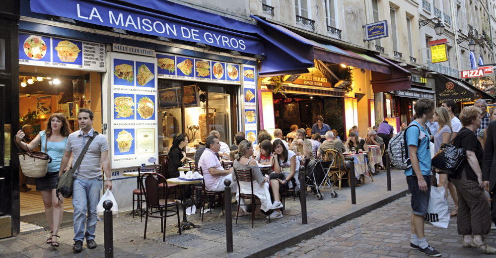 Restaurants line a street of the Quartier Latin in central Paris.