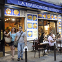 Restaurants line a street of the Quartier Latin in central Paris. Restaurants line a street of the Quartier Latin in central Paris.