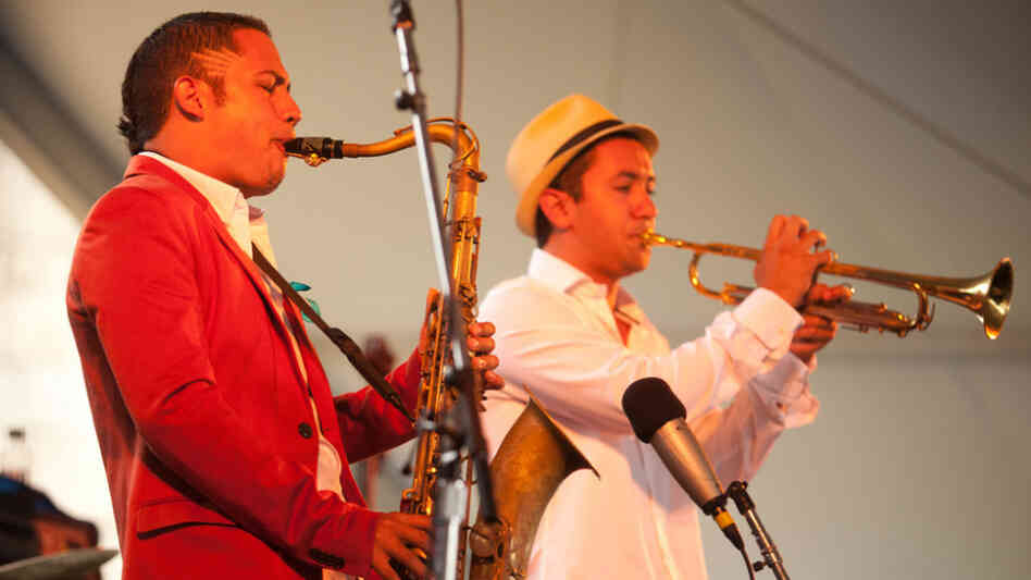 Mario Castro, left, performs with his quintet, including trumpeter David Neves, on the Harbor Stage during the Newport Jazz Festival.