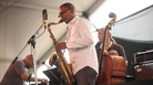 Ravi Coltrane performs with his quartet, including Luis Perdomo (left) and Drew Gress (on bass) on the Harbor Stage during the Newport Jazz Festival. Ravi Coltrane performs with his quartet, including Luis Perdomo (left) and Drew Gress (on bass) on the Harbor Stage during the Newport Jazz Festival.