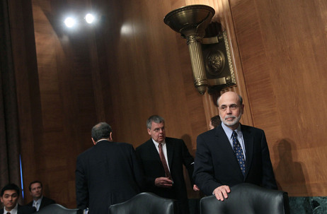 Federal Reserve Board Chairman Ben Bernanke may look to reassure global financial markets Tuesday. Here, he arrives for a Senate Banking, Housing, and Urban Affairs Committee hearing in July. Federal Reserve Board Chairman Ben Bernanke may look to reassure global financial markets Tuesday. Here, he arrives for a Senate Banking, Housing, and Urban Affairs Committee hearing in July.