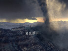 A tornado destroys the Hollywood sign (and everything it stands for) in the 2004 film The Day After Tomorrow. A tornado destroys the Hollywood sign (and everything it stands for) in the 2004 film The Day After Tomorrow.