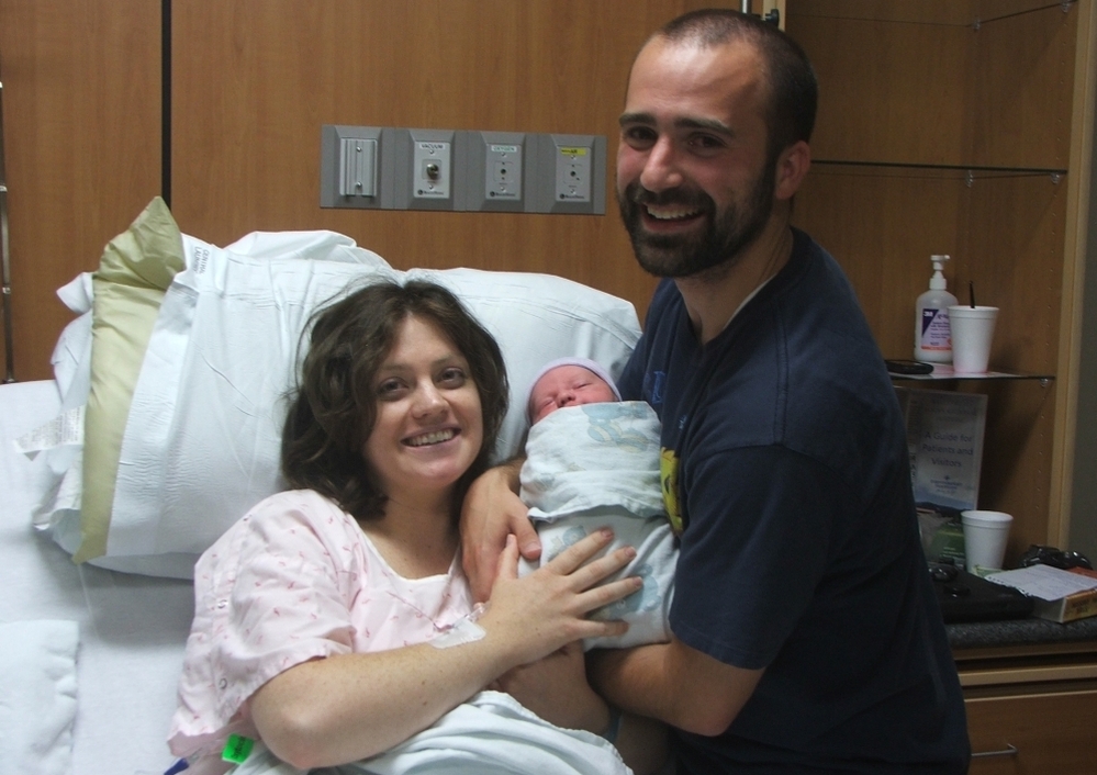 Lucy with her husband Aaron and her son, Dexter.