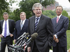 Daimler Trucks North America President and CEO Martin Daum, center, speaks with reporters outside the White House Tuesday after he and other executives met with President Obama to discuss new fuel efficiency standards. Daimler Trucks North America President and CEO Martin Daum, center, speaks with reporters outside the White House Tuesday after he and other executives met with President Obama to discuss new fuel efficiency standards.