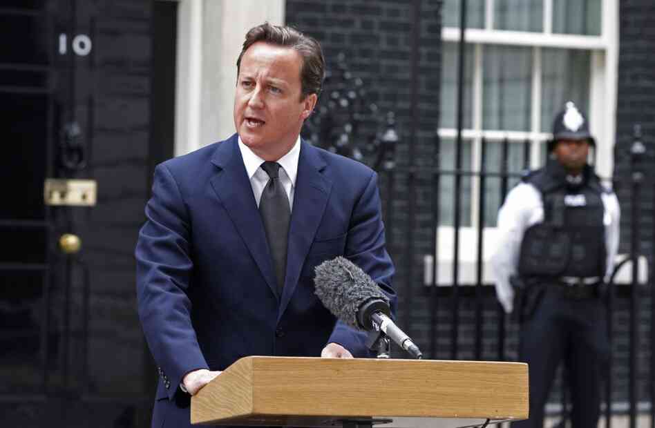 British Prime Minister David Cameron addresses the media in London on Aug. 8. Cameron announced the recall of Parliament from its summer recess to deal with the crisis. 
