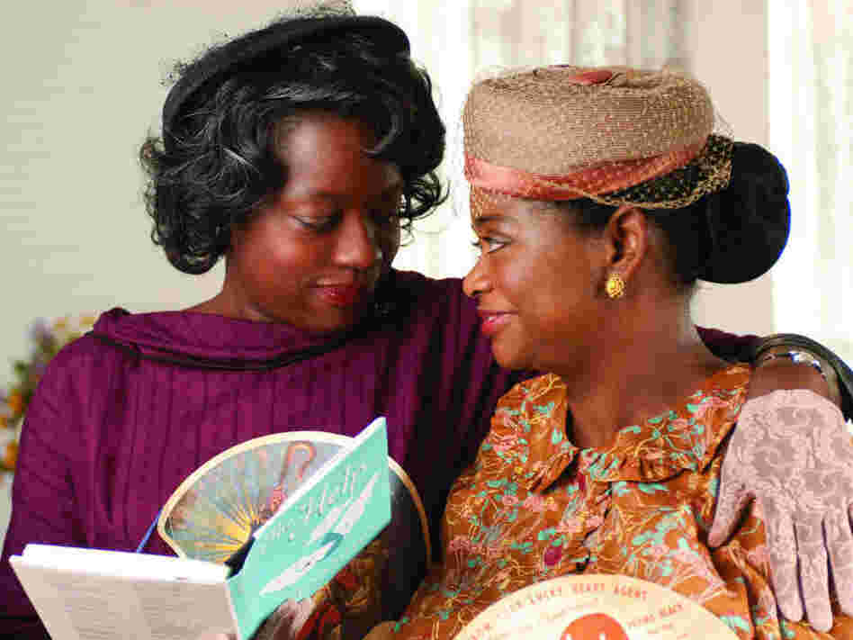 Best friends Aibileen Clark (Viola Davis, left) and Minny Jackson (Octavia Spencer, right) share a special moment in "The Help."