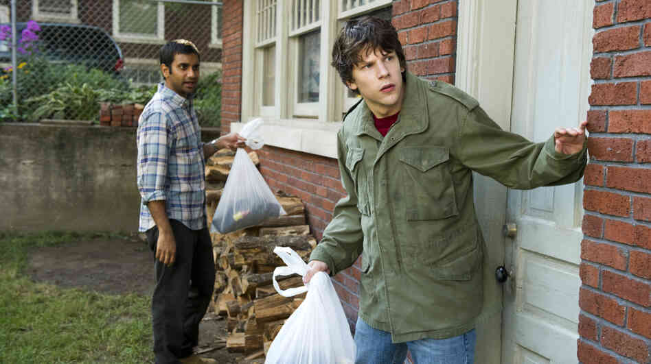 Totally Trashed: Nick (Jesse Eisenberg, right) enlists his best friend Chet (Aziz Ansari) to help him rob a bank after two dim-witted criminals strap a bomb to his chest. Though the pizza-delivery man who inspired the film died in real life, director Ruben Fleischer opts for a lighthearted (and sloppy) approach to the story. Totally Trashed: Nick (Jesse Eisenberg, right) enlists his best friend Chet (Aziz Ansari) to help him rob a bank after two dim-witted criminals strap a bomb to his chest. Though the pizza-delivery man who inspired the film died in real life, director Ruben Fleischer opts for a lighthearted (and sloppy) approach to the story.