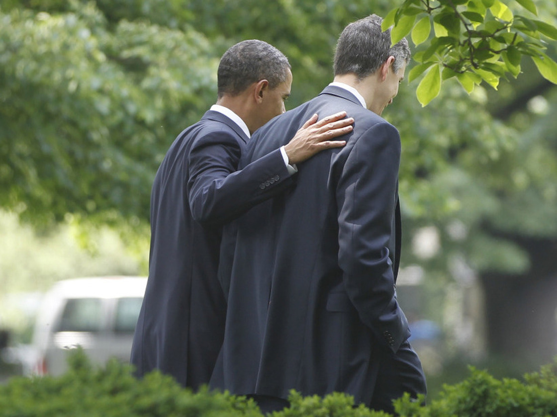 President Barack Obama walks with Education Secretary Arne Duncan at the White House in Washington in May. Duncan wants school to meet a set of condition in order to take advantage of the president's education waivers.