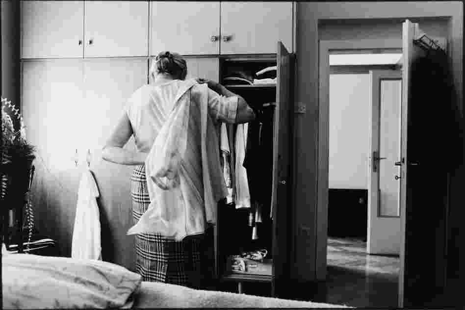 The Widow getting dressed in the morning, humbly and modestly.