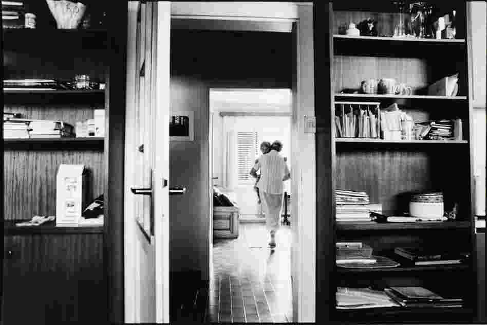 The Widow taking her grandson Igor to the bedroom.