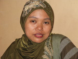 Siami, a curtain-maker who goes by one name, is mother of Alifah Achmad Maulana. Neighbors hounded the family out of their village outside Surabaya, Indonesia, after she complained about cheating on the national high school entrance exam at the village public school. Siami, a curtain-maker who goes by one name, is mother of Alifah Achmad Maulana. Neighbors hounded the family out of their village outside Surabaya, Indonesia, after she complained about cheating on the national high school entrance exam at the village public school.