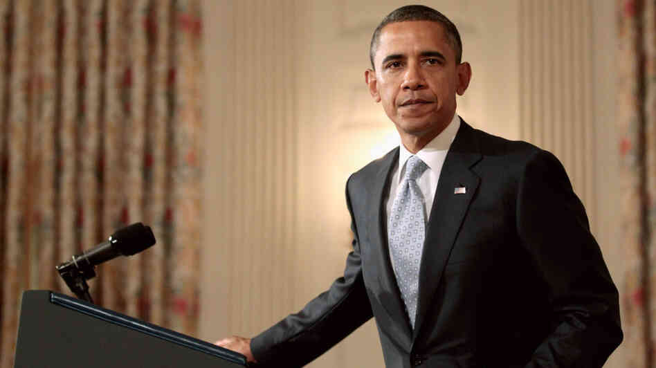 President Obama walks away from the podium Monday after speaking about the debt downgrade in the State Dining Room of the White House. President Obama walks away from the podium Monday after speaking about the debt downgrade in the State Dining Room of the White House.