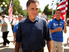 Republican presidential candidate Mitt Romney (center) introduces himself to voters at the Iowa State Fair Thursday in Des Moines, Iowa. Republican presidential candidate Mitt Romney (center) introduces himself to voters at the Iowa State Fair Thursday in Des Moines, Iowa.